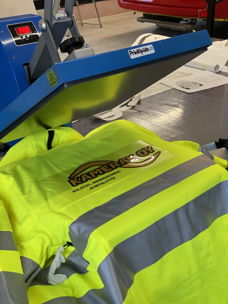 Kameran Oy huomiotakki lämpöpainatus