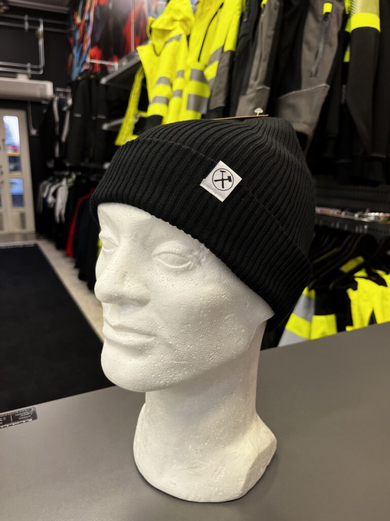 Logopipo musta ristimerkki mallinukke